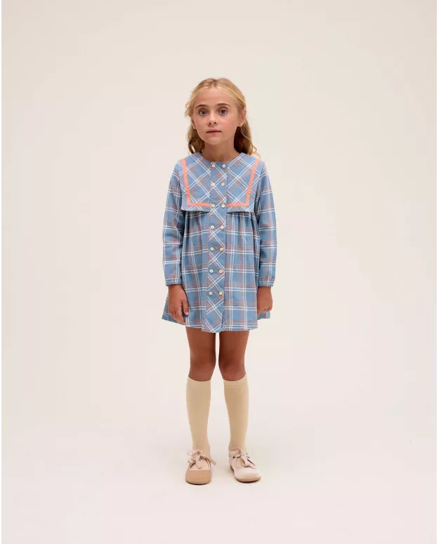 Vestido de niña azul con detalle botones y ribete naranja