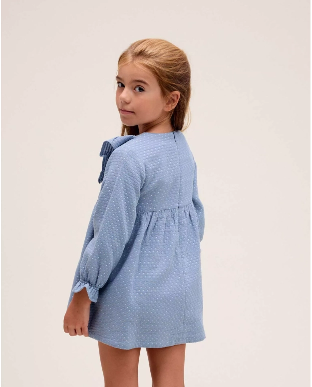 Vestido de niña azul con detalle de lazo y topitos blancos
