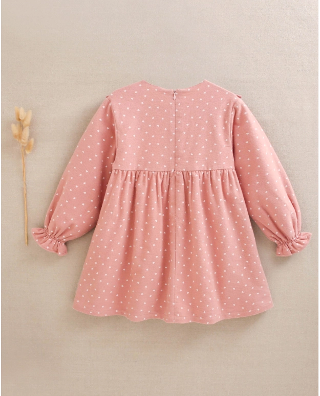 Vestido de niña rosa con estampado de corazones