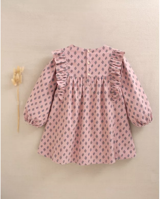 Vestido de niña rosa con estampado de hojas azules